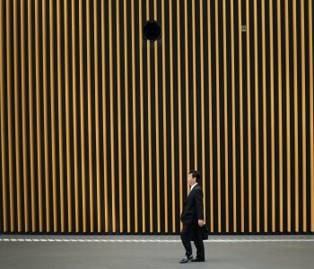 Man in suit Japandi architecture