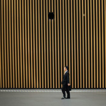 Man in suit Japandi architecture